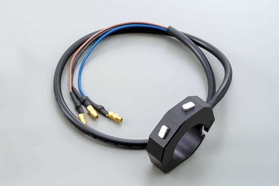 DAYTONA Commodo CNC externe avec 2 boutons poussoirs, noir, pour guidon 7/8 et 1 pouce (réf. 46300)